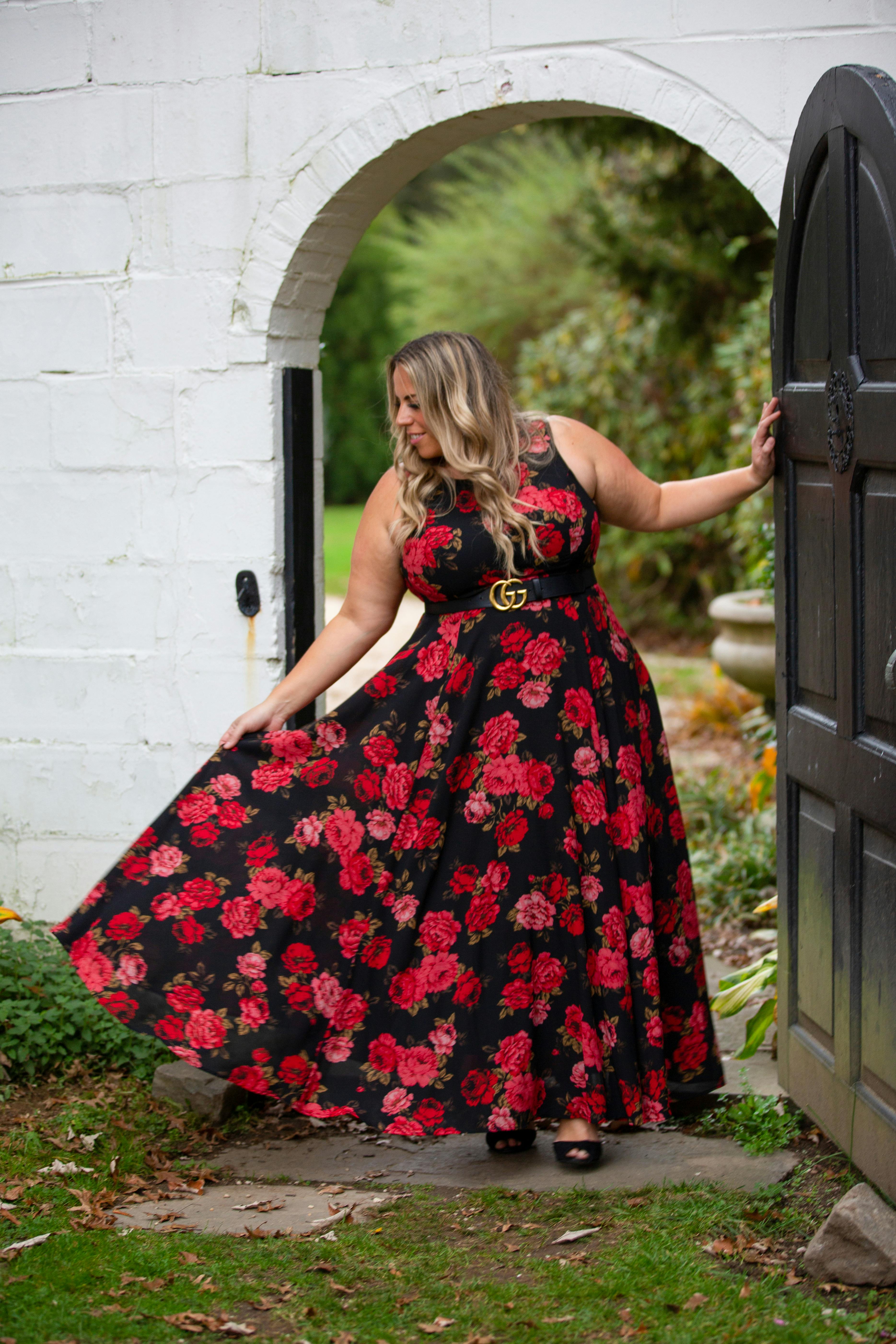 woman confidently wearing vibrant dress