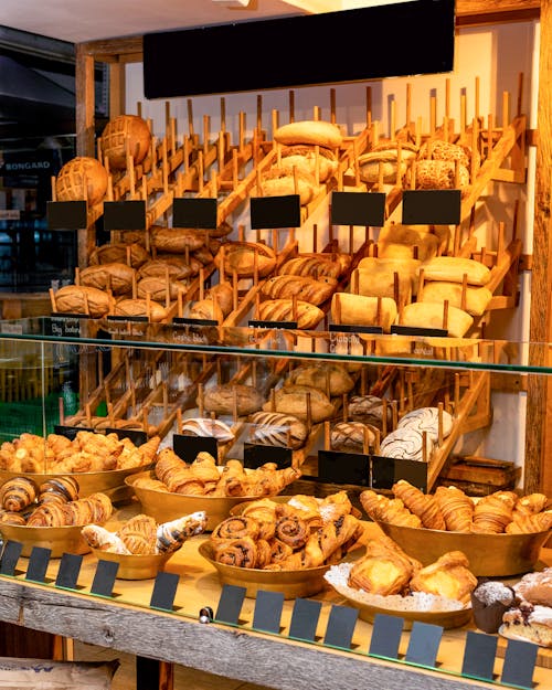 Bread on Clear Glass Display Counter