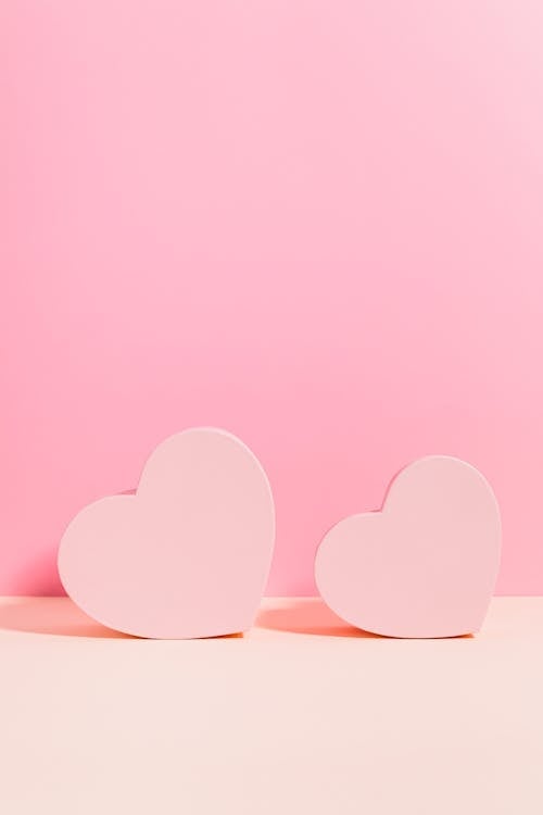 Two Pink Heart Illustration on Pink Background