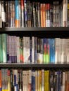 Books on Black Wooden Shelves
