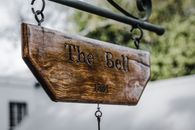 Signboard with inscription on wooden board