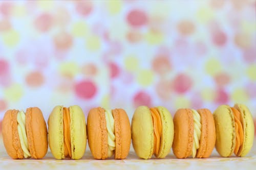 Photo of Orange and Yellow Macarons