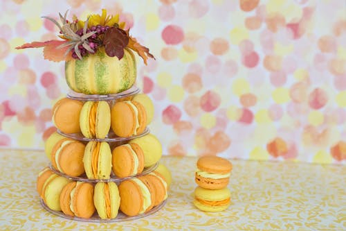 Yellow and Orange Macaroons on Multi Layer Tray