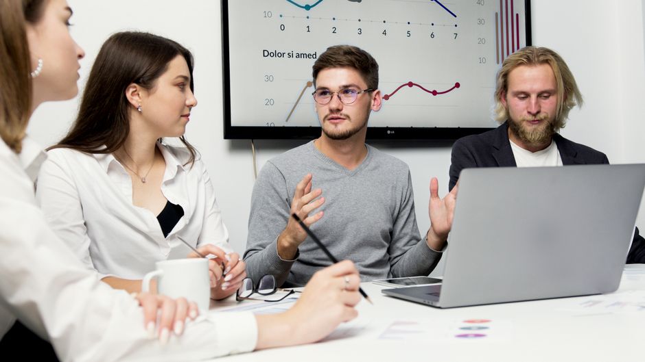 team meeting discussing strategy office