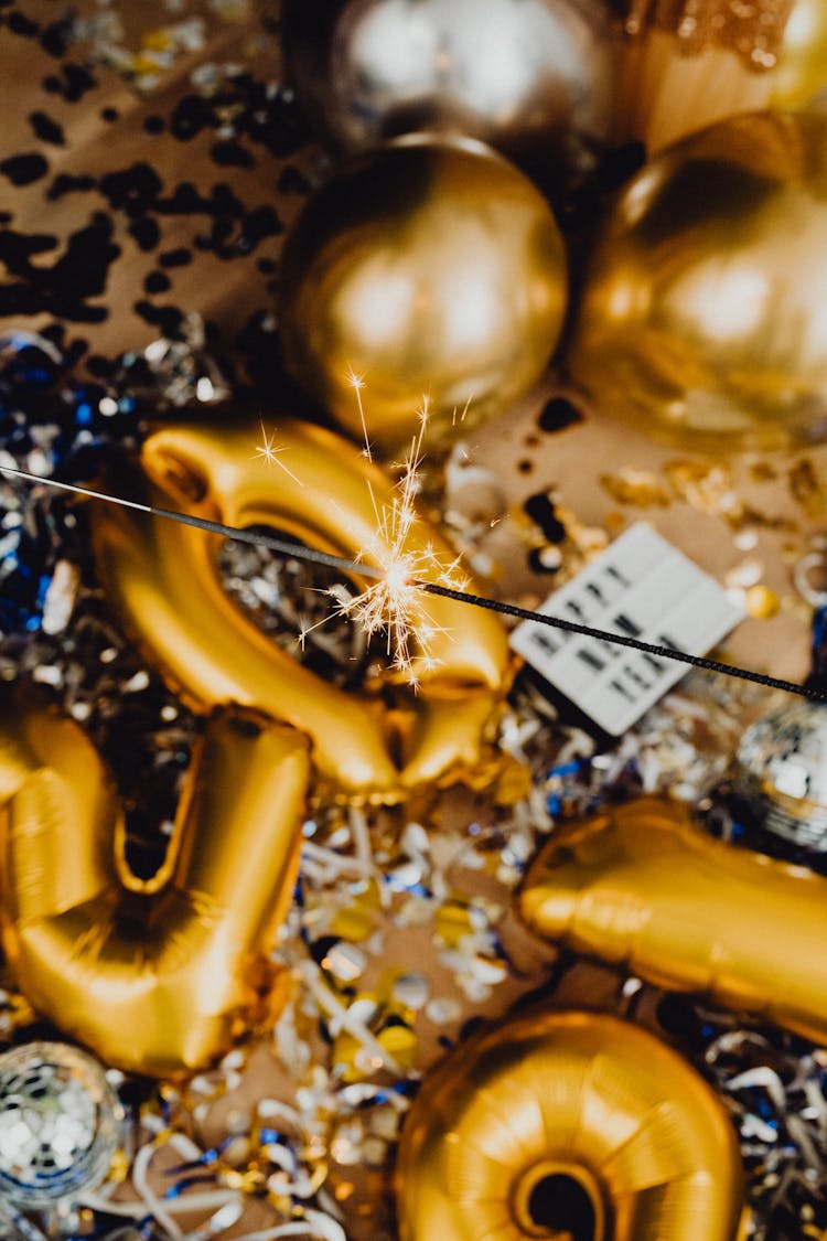 Sparkler, Confetti And Gold Party Balloons