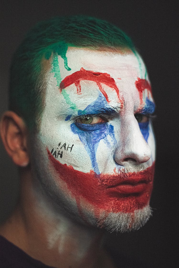 Man Wearing Halloween Makeup Of Clown