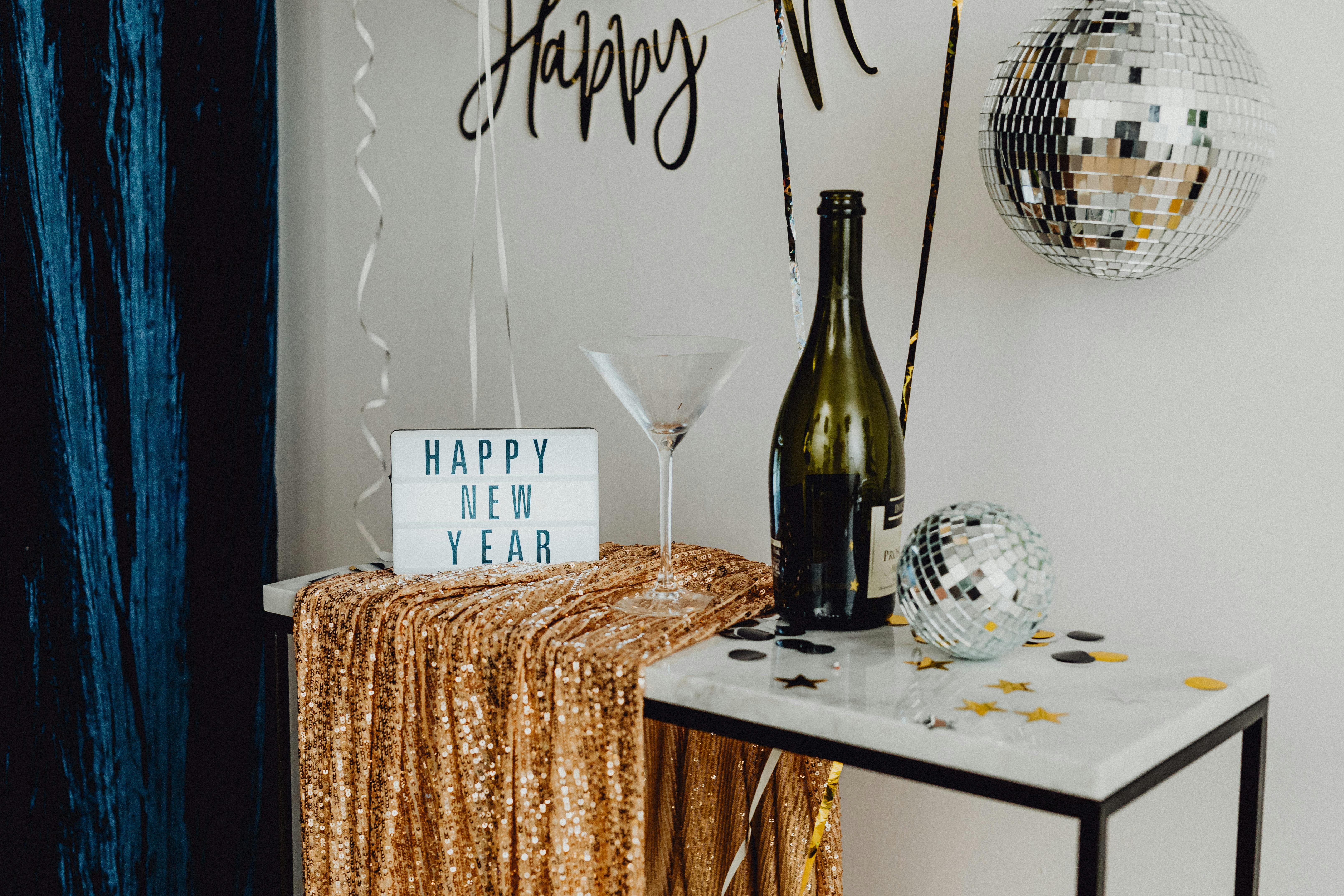 glass and bottle of champagne on table