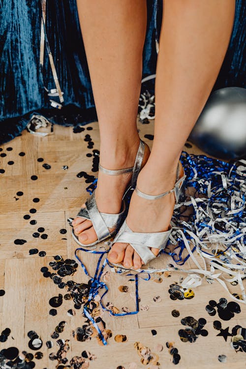 Person in Silver Peep Toe Sandals