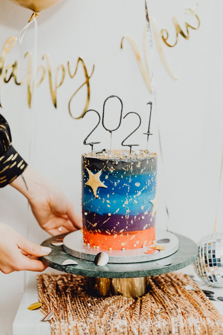 Colorful Cake With Number Candles On Top 