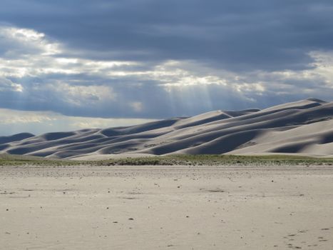 White Sand Under the Cloudy Sky 