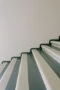 Stairway with striped stairs in residential building