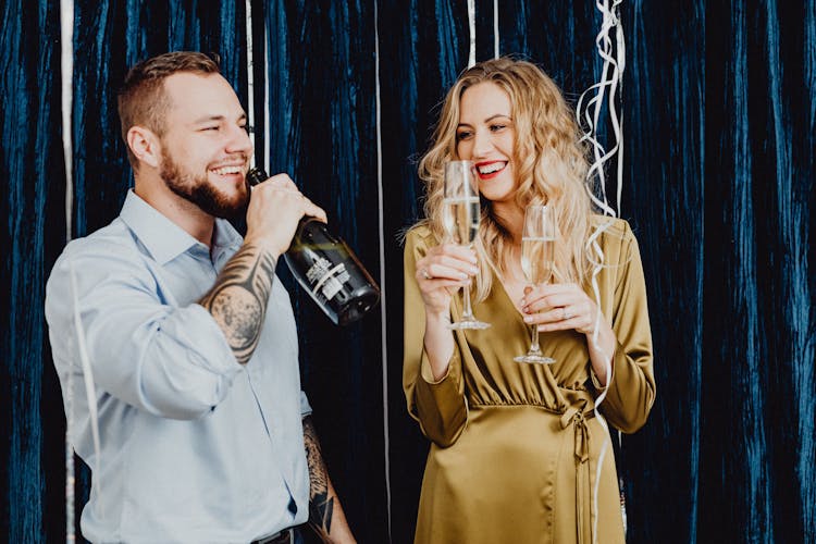 Man And Woman Drinking Champagne