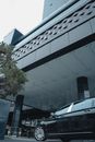 White Car Parked Beside White Building