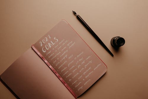 Free Brown Notebook on the Table Stock Photo