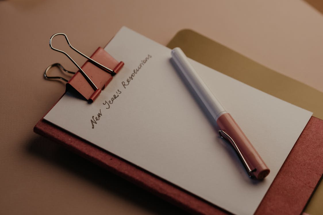 Free Red Notebook on the Table Stock Photo