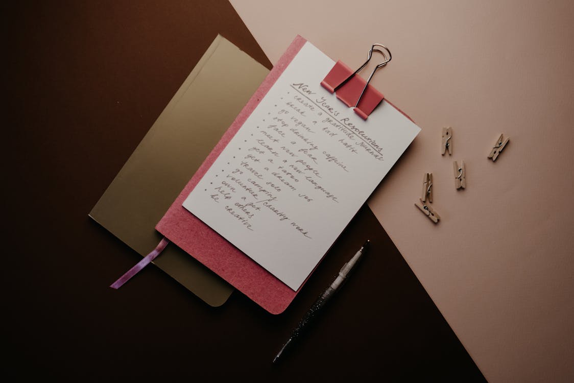 Free Red Notebook on the Table Stock Photo