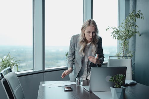 Free Woman in Gray Blazer Having a Video Conferencing Stock Photo
