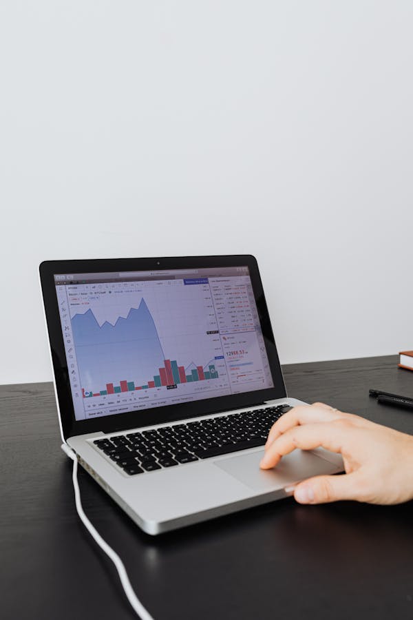 Laptop with financial charts