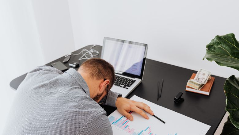 Tired office worker at a desk