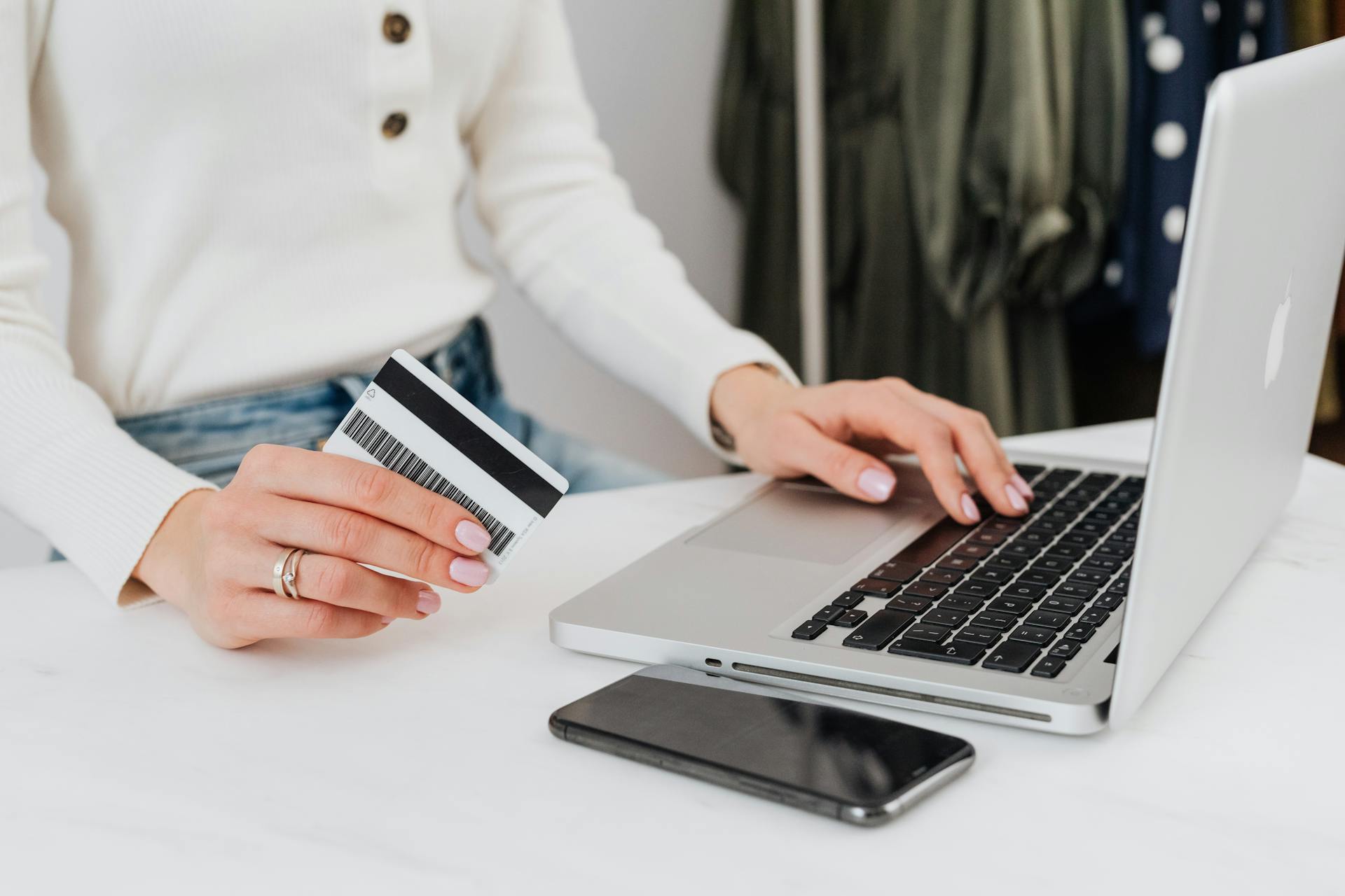 A Person Holding a Bank Card