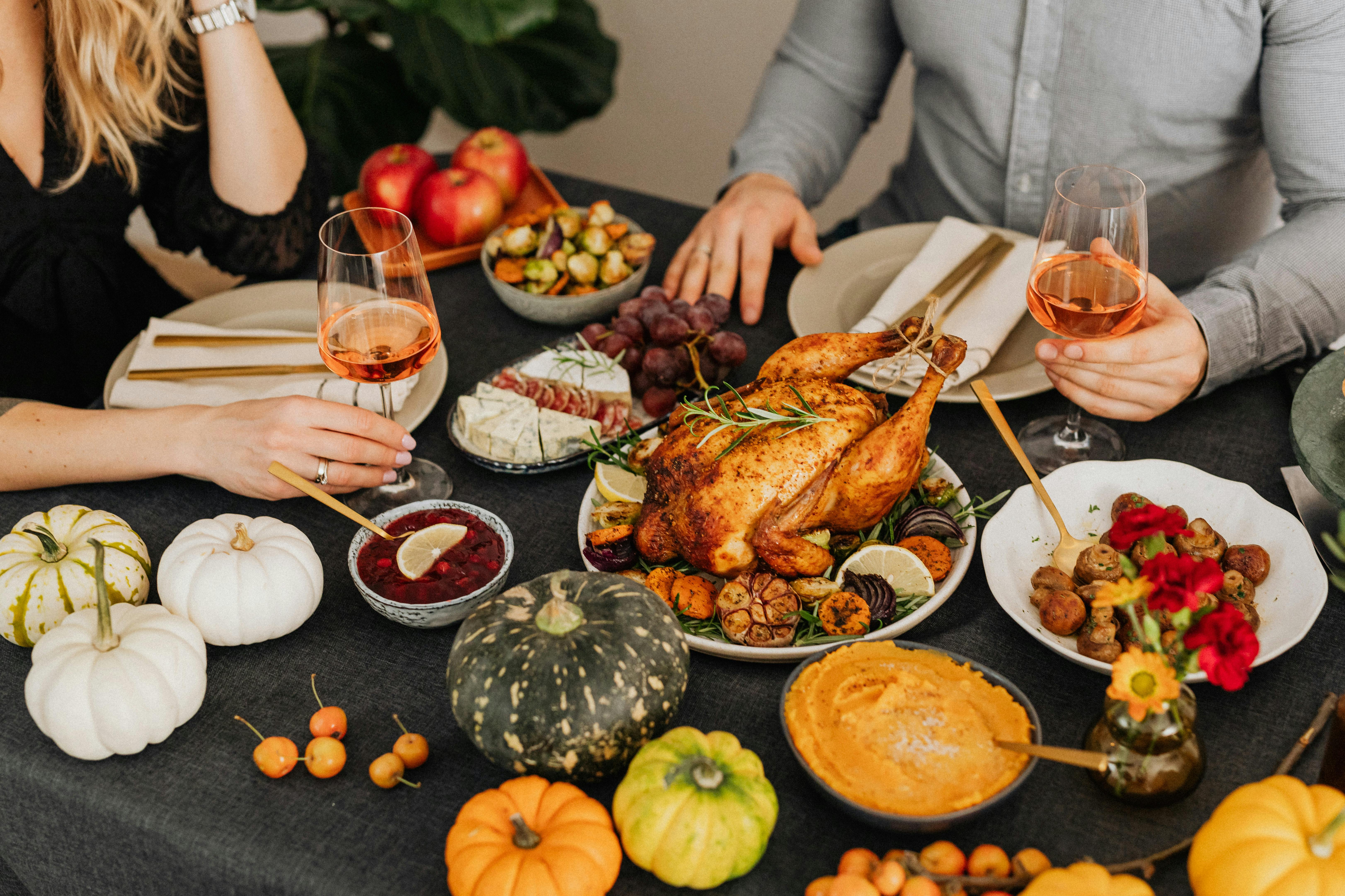 couple having thanksgiving dinner at table