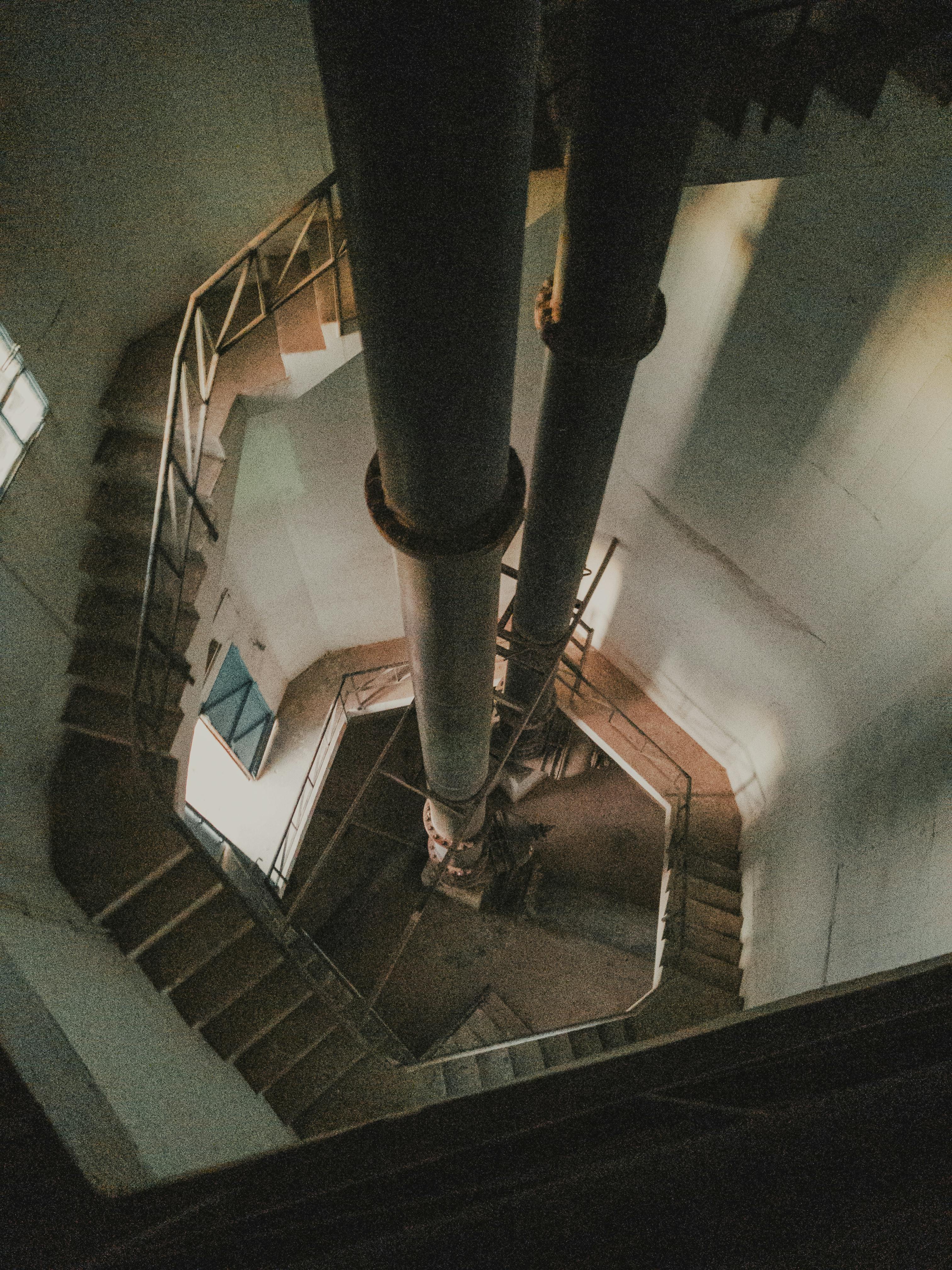 Hand whisking a creamy tahini dressing in a small bowl