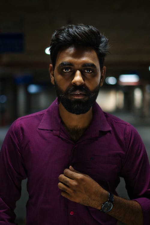 Free Man in Purple Polo Shirt Stock Photo