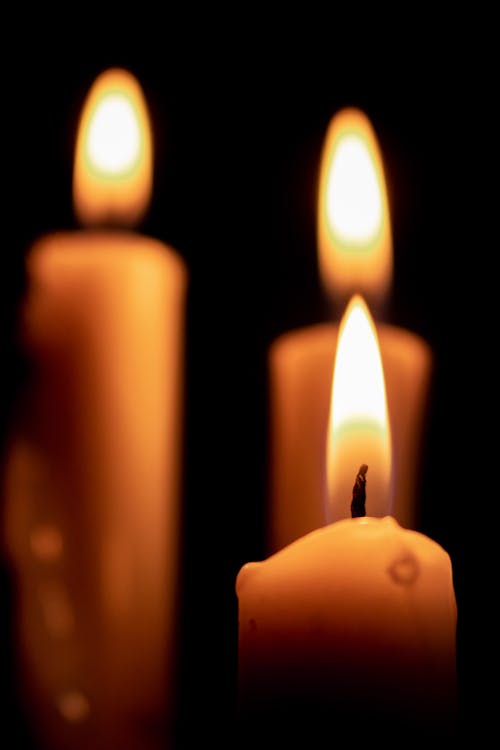 Close-Up Shot of Lighted Candles 