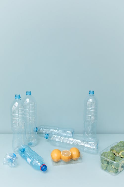 Close-Up Shot of Vegetables and Fruits in Plastic Containers