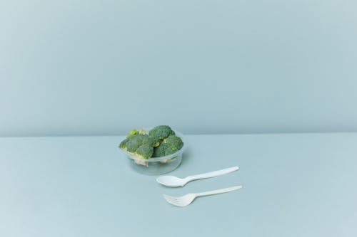 Close-Up Shot of Broccoli in a Plastic Container