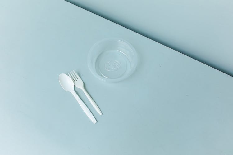 Plastic Spoon And Fork And Container 