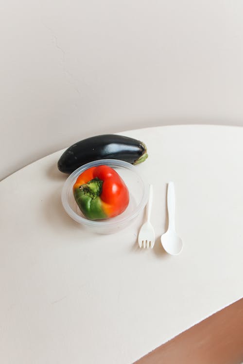 Bell Pepper and Eggplant on Table