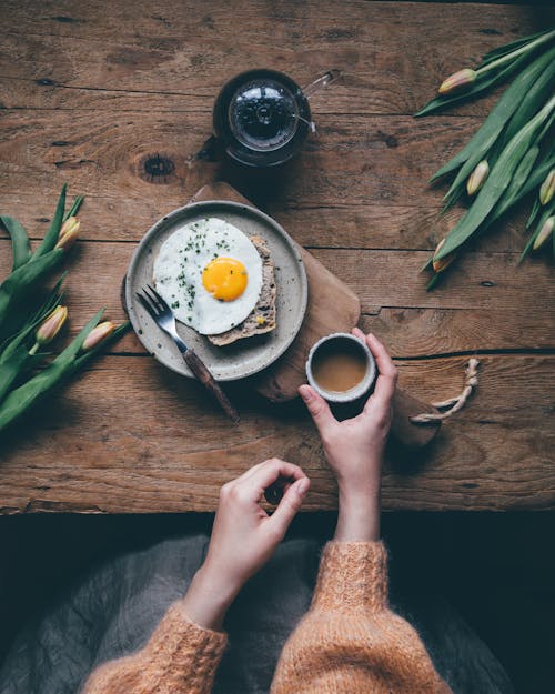 Free Woman Eating Breakfast Drinking Coffee Stock Photo