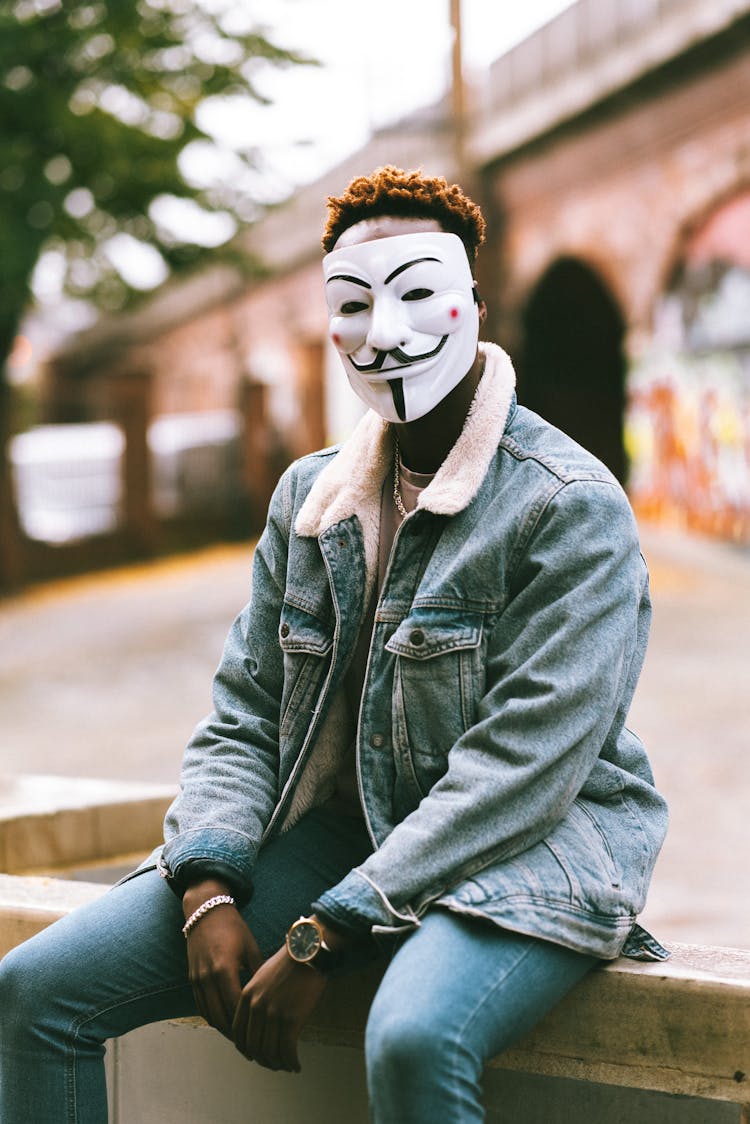 Man Wearing A Guy Fawkes Mask