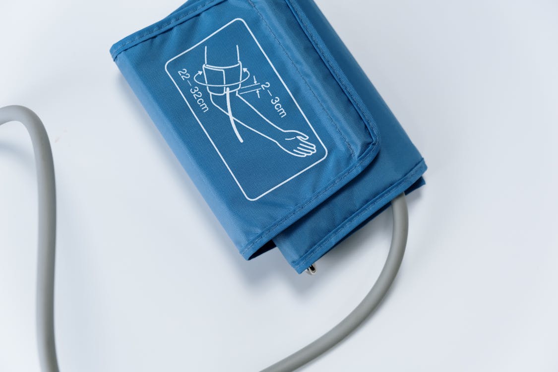 A Sphygmomanometer on White Surface
