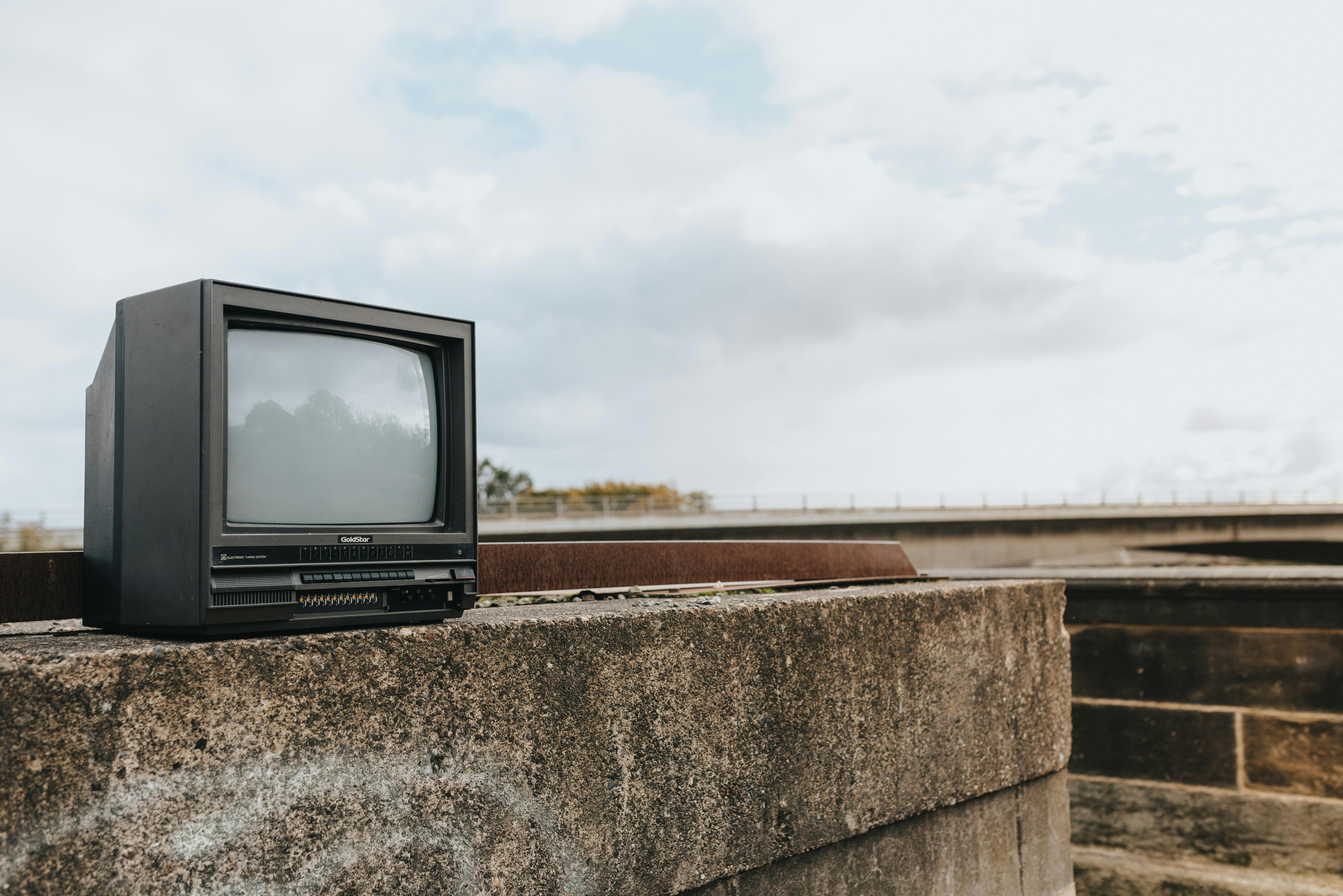 retro tv set on stone surface