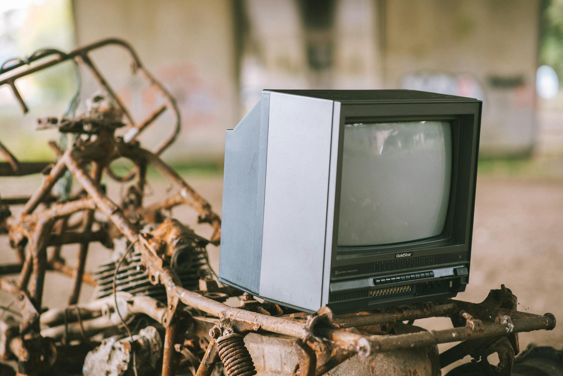 Retro TV set on rusty structure