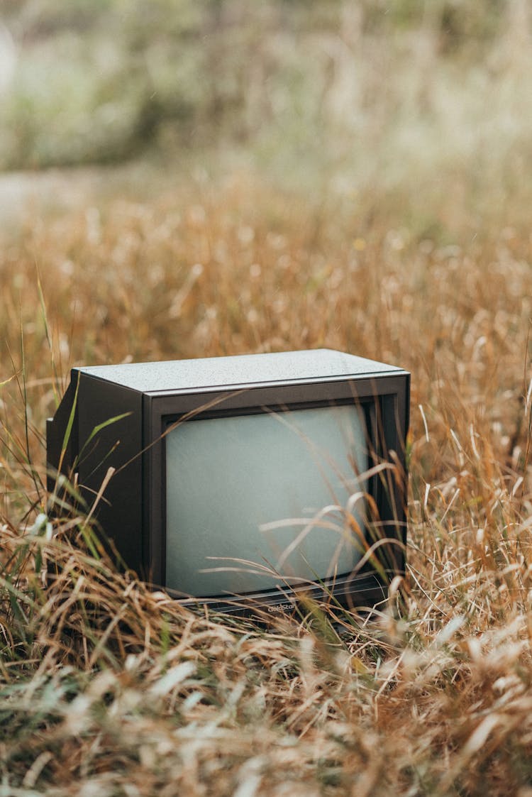 Used TV Set On Withered Grass