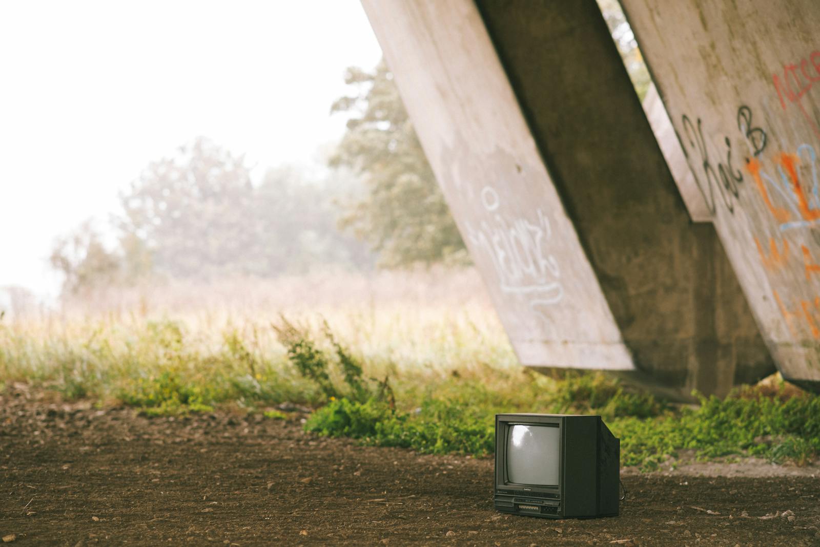 A television studio control room showing video remixing on multiple monitors