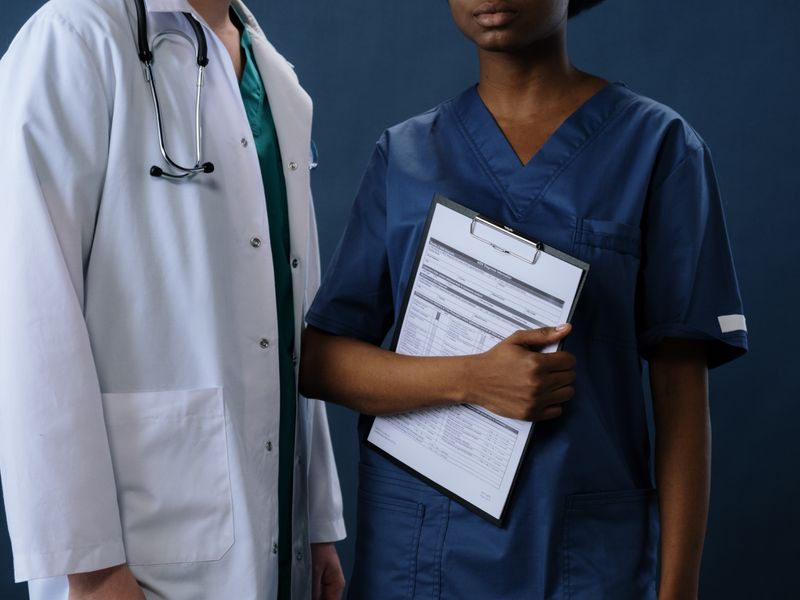 Group of young doctors in scrubs