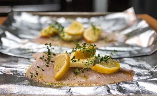A Salmon Fillet Topped with Lemon Slices