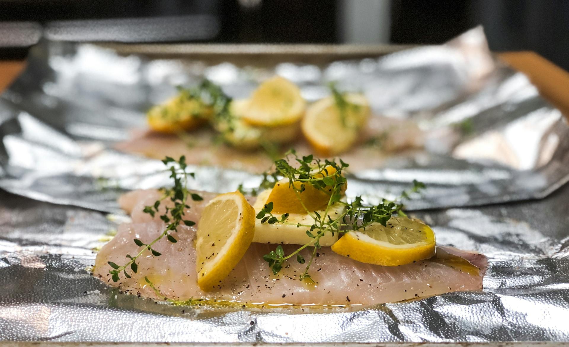 A Salmon Fillet Topped with Lemon Slices