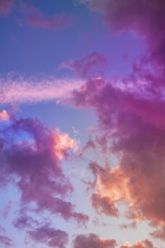 Captivating view of colorful clouds at sunset in Romeral, Maule, Chile.