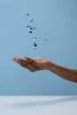 A Person Catching Pills