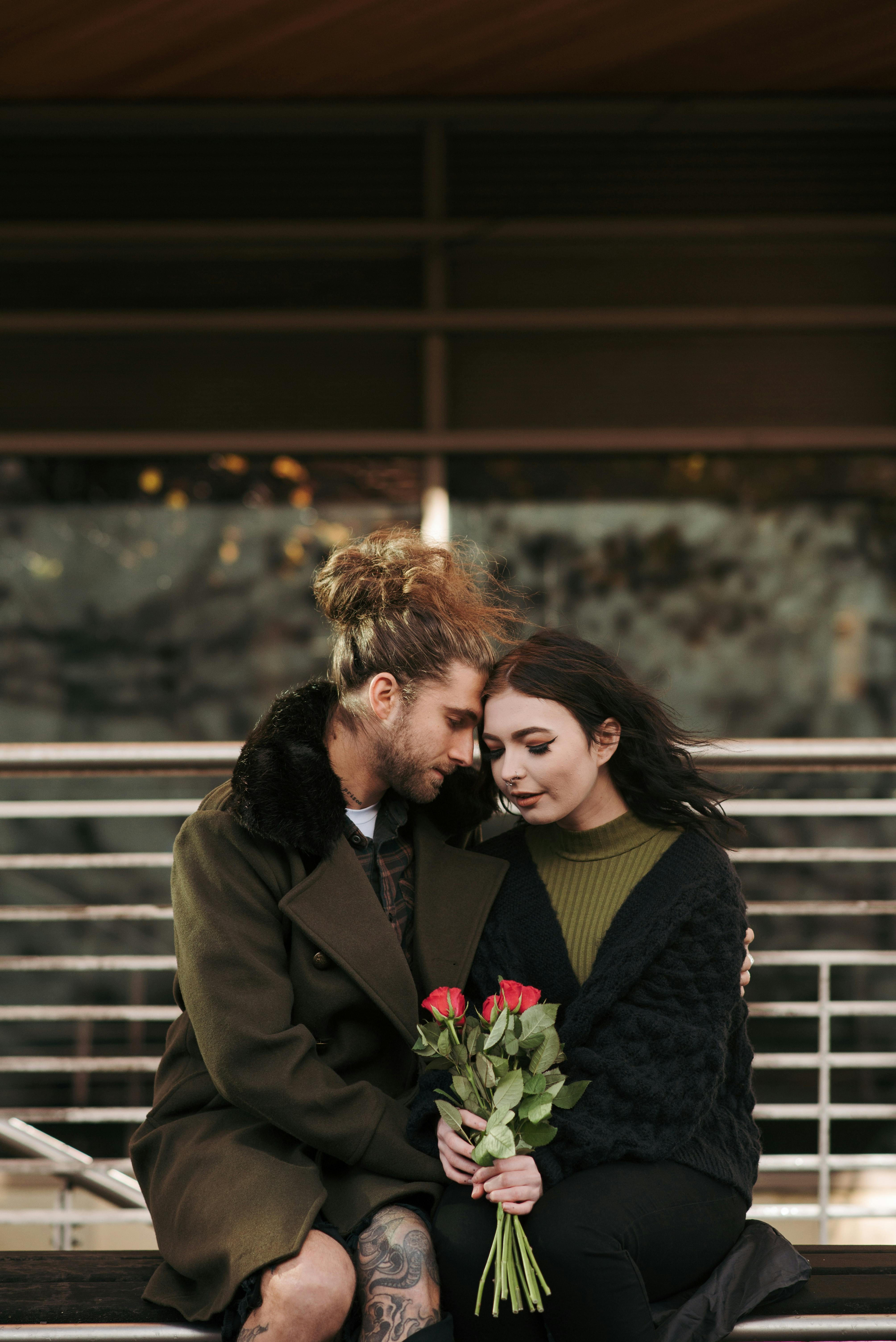 AI generated Beautiful inlove man and woman with flowers and gift box.  Happy couple in Valentine's Day 36468816 Stock Photo at Vecteezy