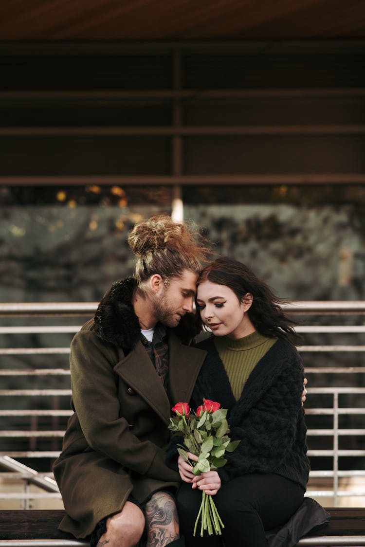 Hipster Man Embracing Beloved On Urban Bench