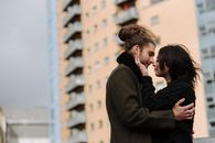 Loving couple caressing on street