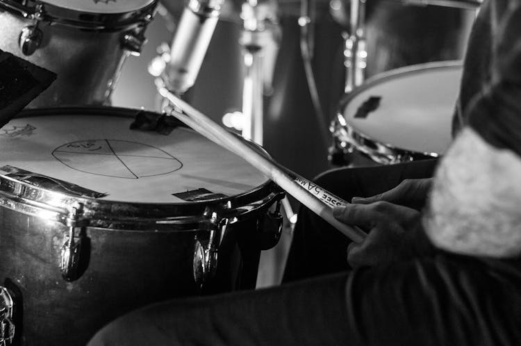 Crop Drummer Performing During Rock Concert