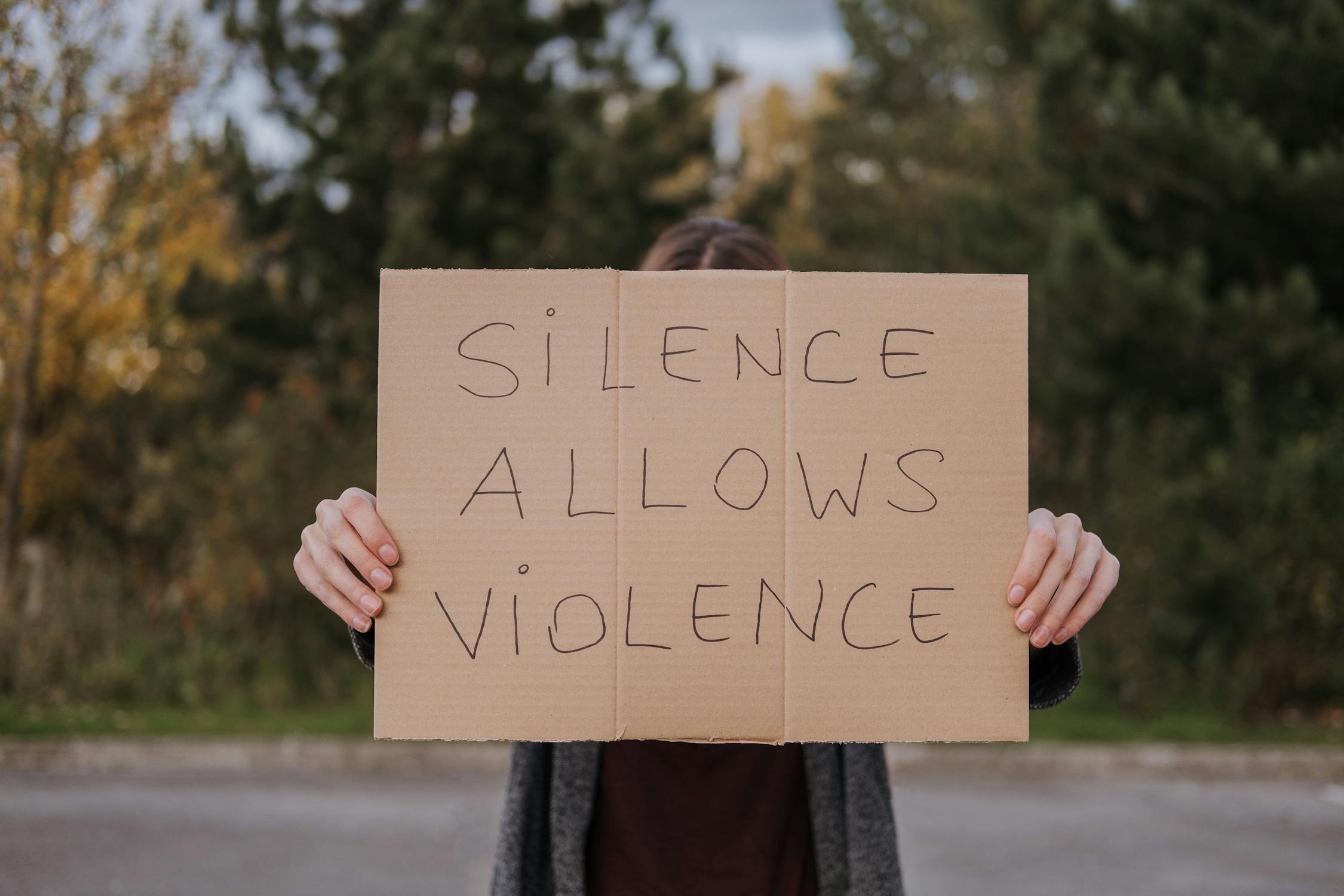 Sign that reads: silence allows violence