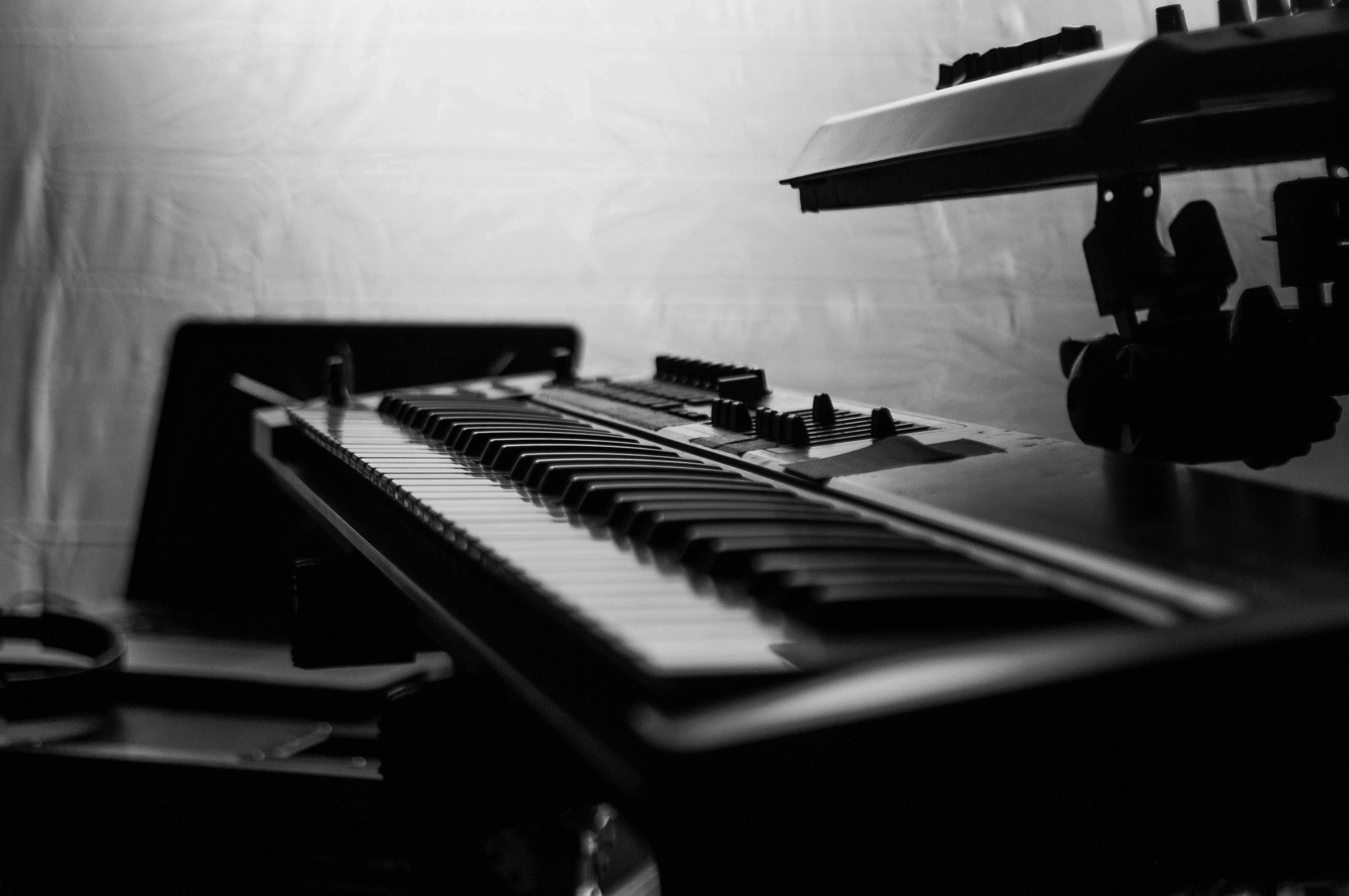 synthesizer near musical equipment in studio